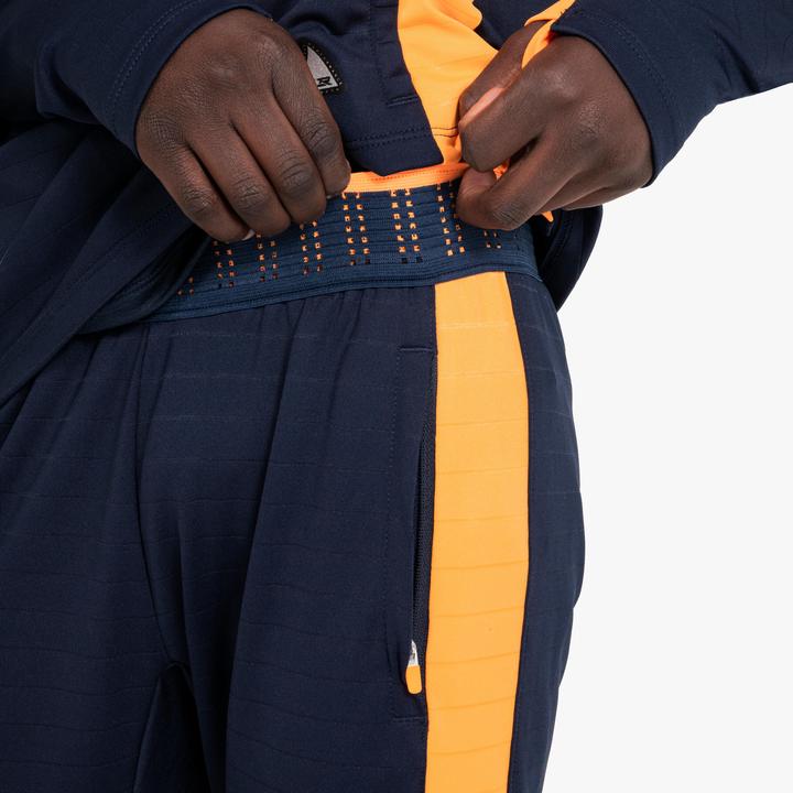 Immagine prodotto Kipsta Pantaloni da allenamento da calcio per bambini - CLR arancione/blu scuro (8, 9, 10)