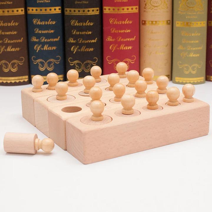 Immagine prodotto Activity Board Presa a cilindro con pomello Giocattolo per lo sviluppo sensoriale e la coordinazione occhio-mano