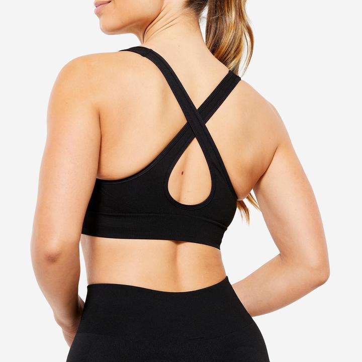 Actual product image Decathlon Women's sports bra light support crossed straps - black (L)