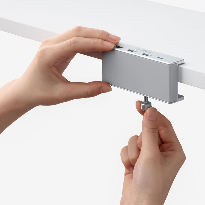 Immagine prodotto Orico Converter MH4PC Hub Clamp-Mounted USB-C / 3x USB-A 3.0 + 1x USB-C 3.0 - Silver (USB-C)
