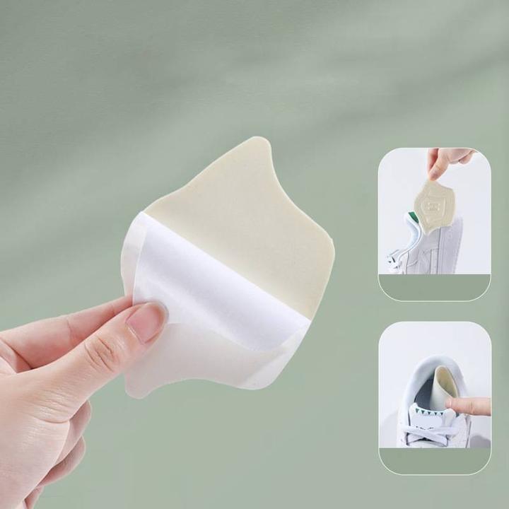 Immagine prodotto Stride Fersen Einlage Anti-Rutsch / Ultraweiche Stoff Pads / Massage Einlagen für Turnschuhe - 1 Paar Weiss