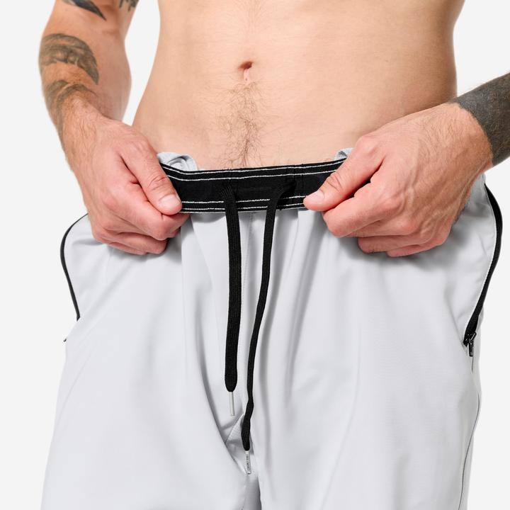 Image du produit Domyos Short de fitness respirant poches zippés homme, gris perle (L)