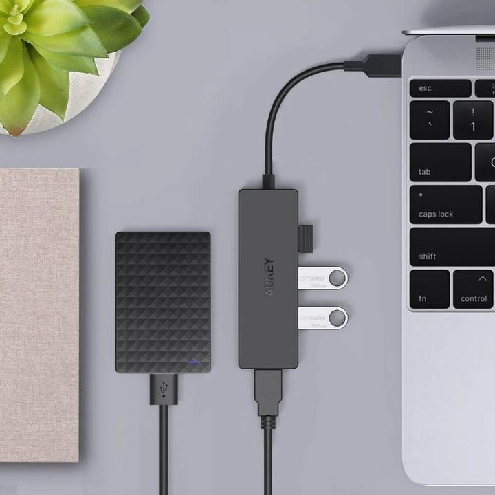 Produktbild Aukey CB-C64 Schnittstellen-Hub Schwarz Grau (USB-C, 4 Ports)