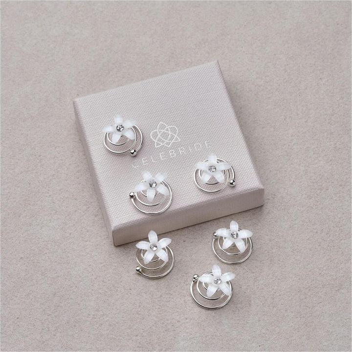 Produktbild Trisa Celebride Curlies in Form von weissen Blumen