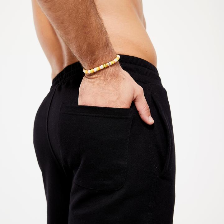 Immagine prodotto Domyos Pantaloni da jogging caldi da uomo - 100 nero (W34/L34)