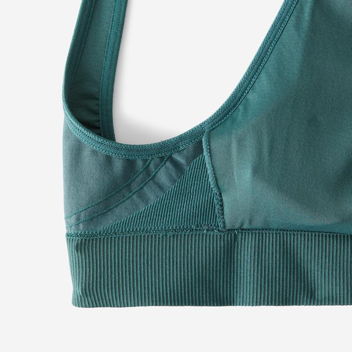 Produktbild Decathlon Sport-Bustier Damen gekreuzte Träger leichter Halt - türkis (S)