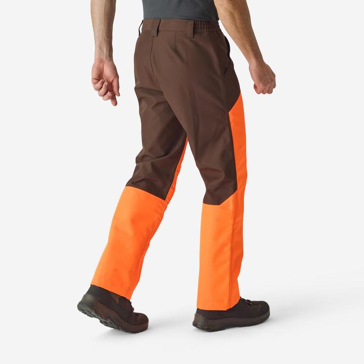 Image du produit Solognac Pantalon de pluie de chasse Renfort 500 orange/marron (L)