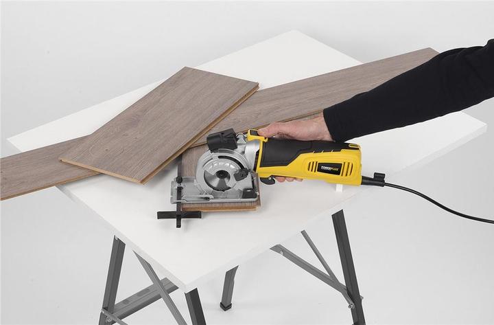 Produktbild Powerplus POWX1365MB Kreissäge - 600W - 89mm - Inkl. Laser, Absaugung, 3 Kreissägeblätter und Gehrungslade