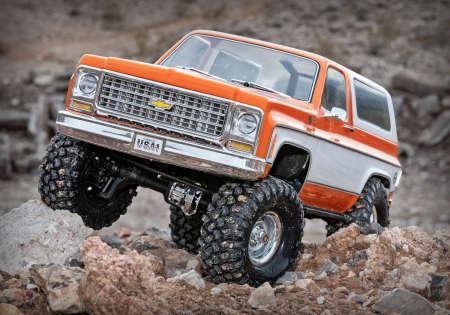 Immagine prodotto Traxxas TRX-4 79 Chevy Blazer arancione/bianco 1/10 Crawler RTR spazzolato, Clipless, senza batteria e (RTR pronto all'uso)