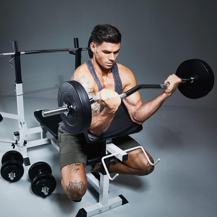 Produktbild Gorilla Sports Langhantelset (4 x 1.25 kg, 4 x 2.5 kg, 2 x 5 kg, 2 x 10 kg, 2 x 15 kg)